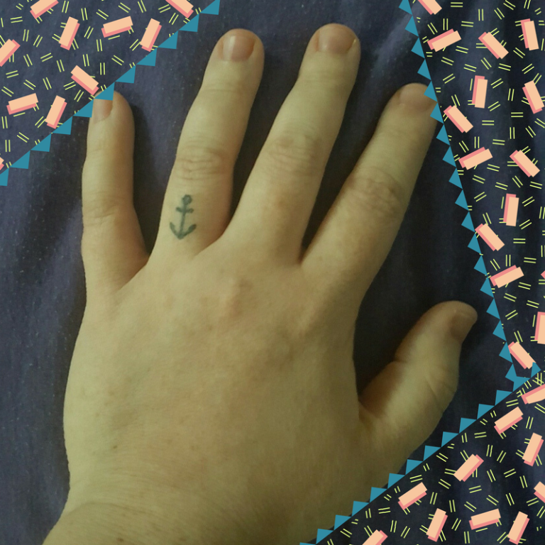 anchor, wedding ring tattoo
